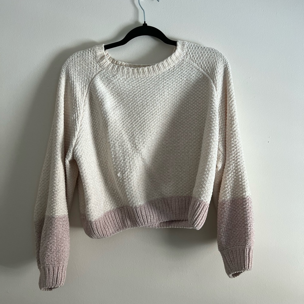 Kittenish sweater worn a few times has a pull in the front and back